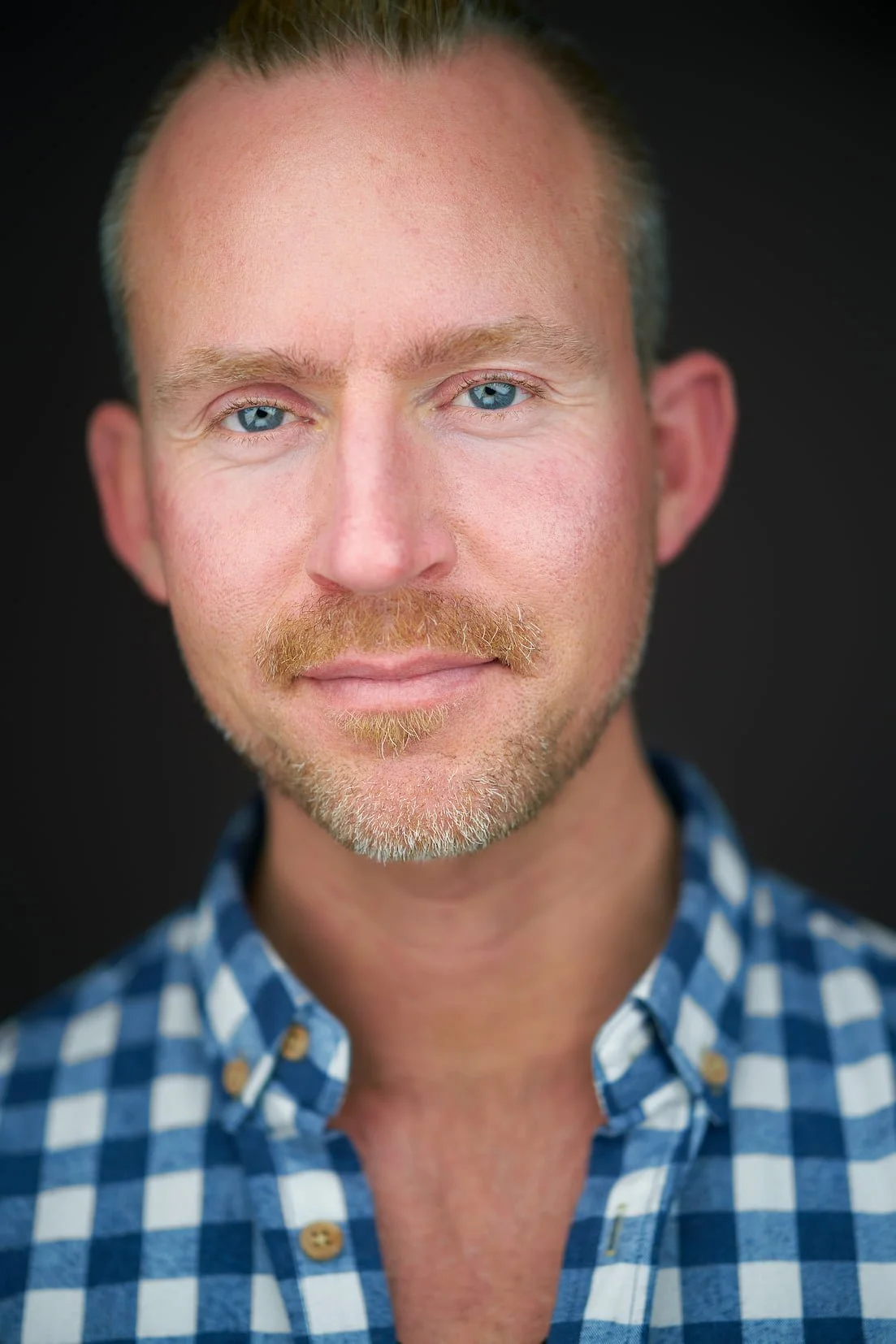 Maverick Mode headshot of Lasse, a tight cinematic crop from an Edmonton headshot session