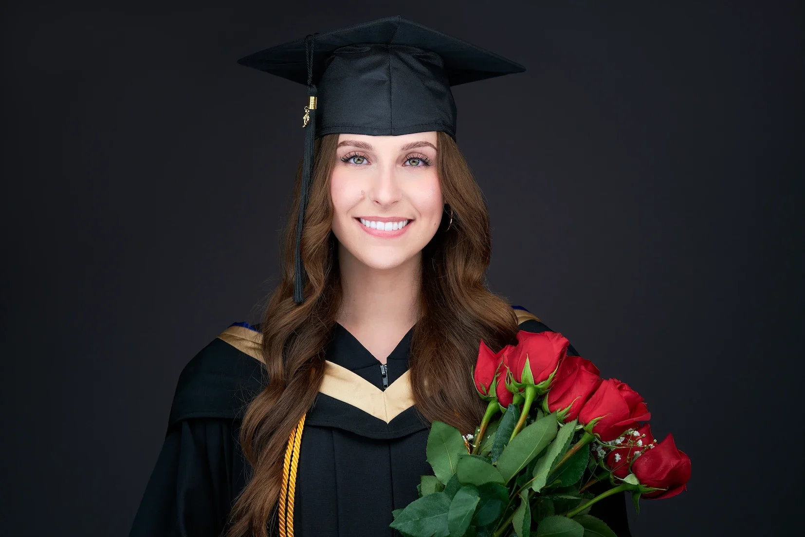 Graduation headshot of Elise, a student in Edmonton, photographed at Maverick Studios