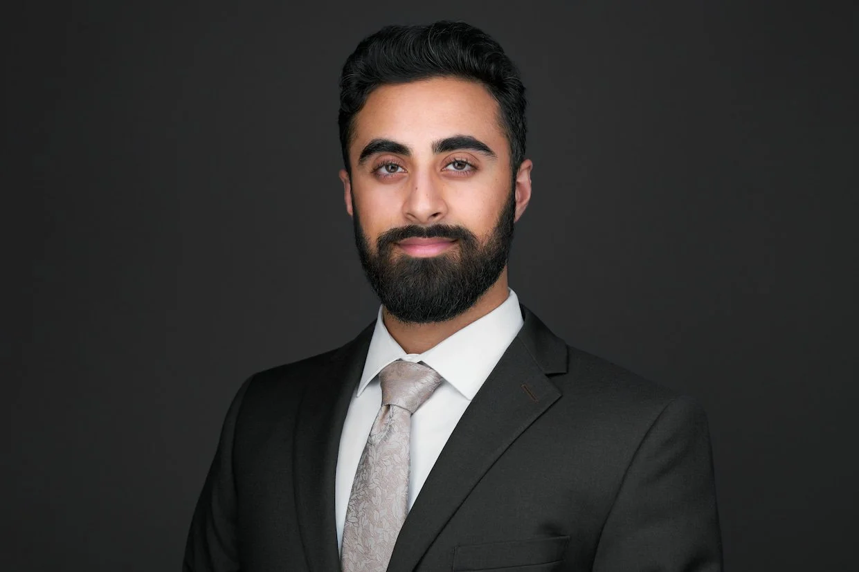 Dark Mode professional headshot of Noble at Maverick Studios in Edmonton, Alberta