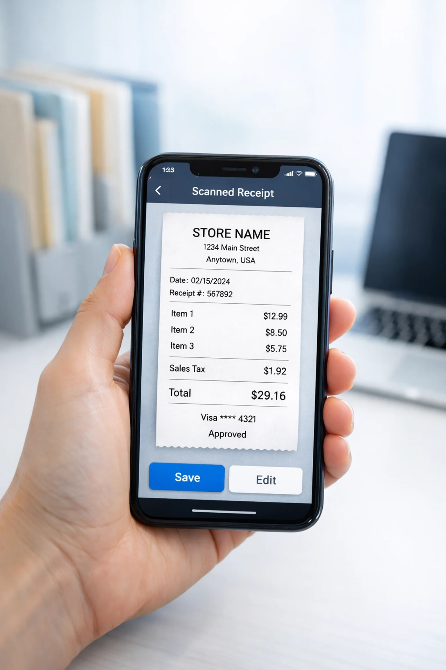 Hand holding smartphone with receipt scanning app