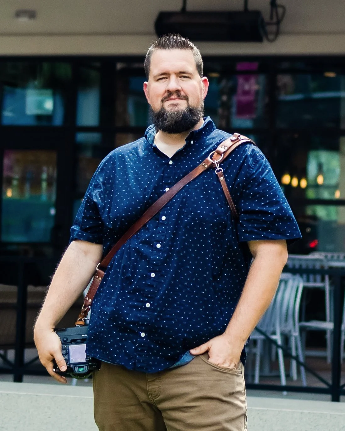 Aaron Creamer, founder of Poshy Peach, with his camera in Tampa