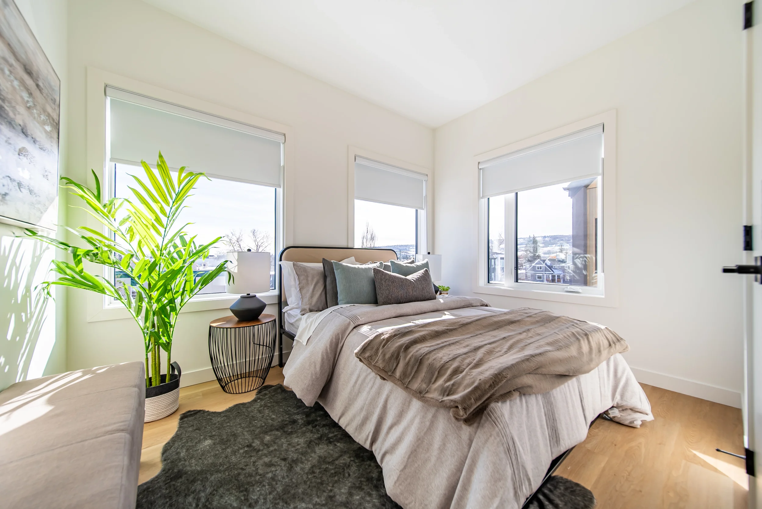 Spacious kitchen inside townhomes for rent in Calgary featuring modern cabinetry and open concept layout