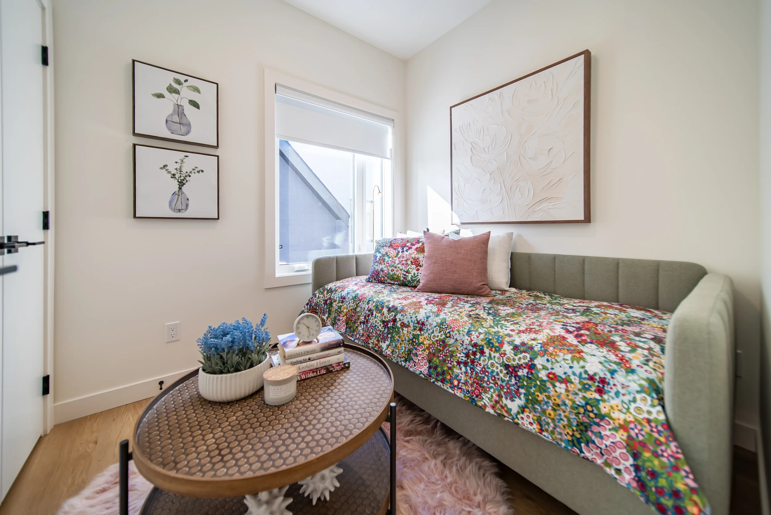 Exterior view of modern townhomes for rent in Calgary with landscaped surroundings and parking access