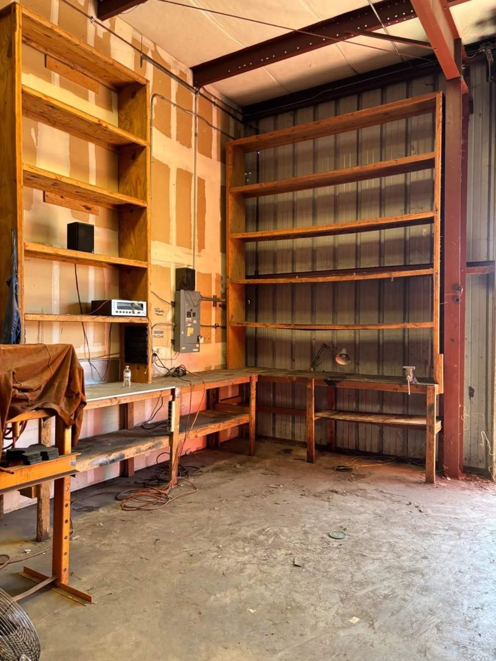 Cleared warehouse shelving and floor from a real Junk Boys cleanout