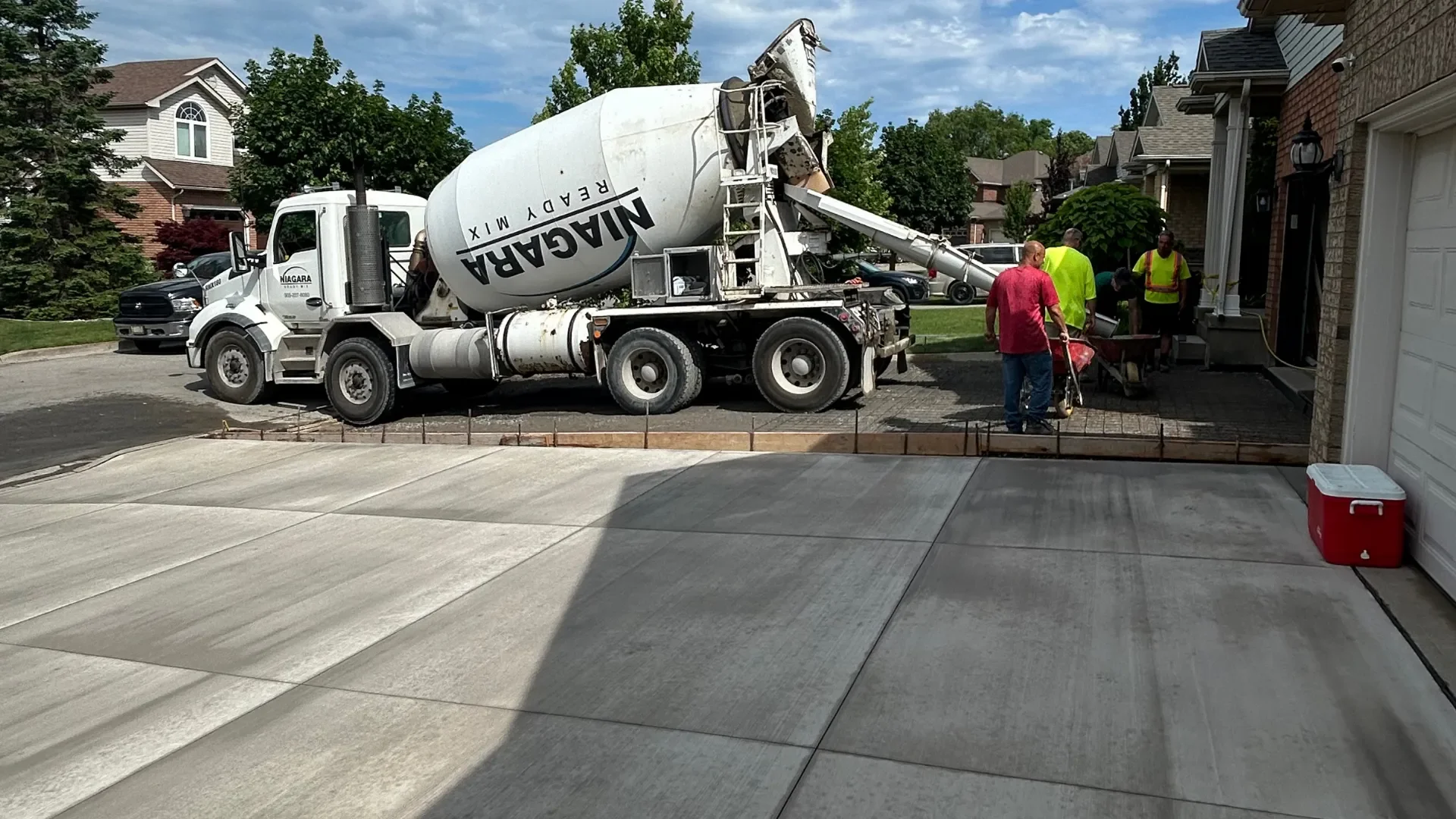 Niagara Ready Mix truck pouring a new residential concrete driveway in Lincoln