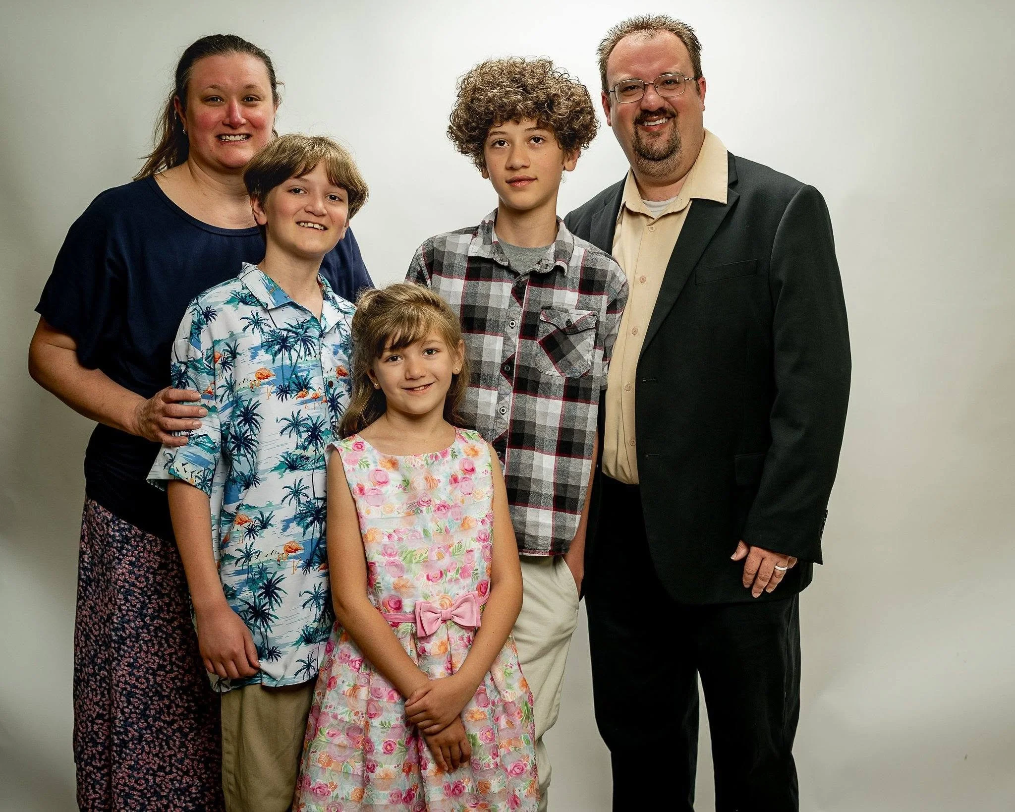 Clayton Travis and Trina Johnson with their family