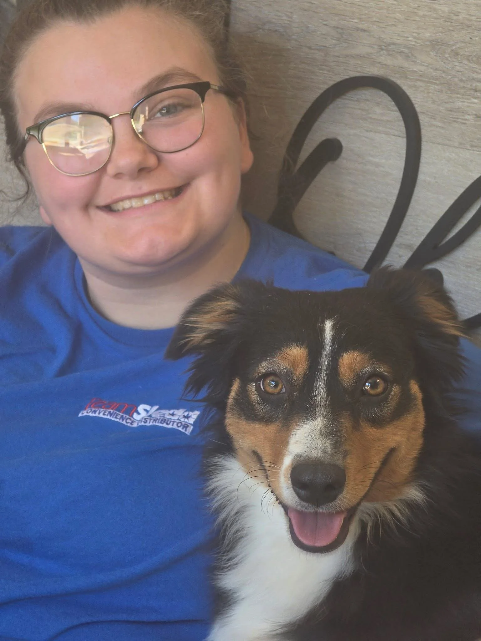 Lila with a volunteer at the Humane Society