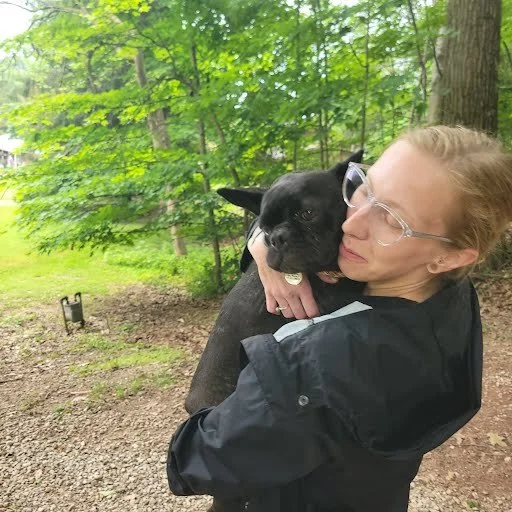 Jessica holding Zorii (Zuzu) after recovery, Tuesday June 9, 2026