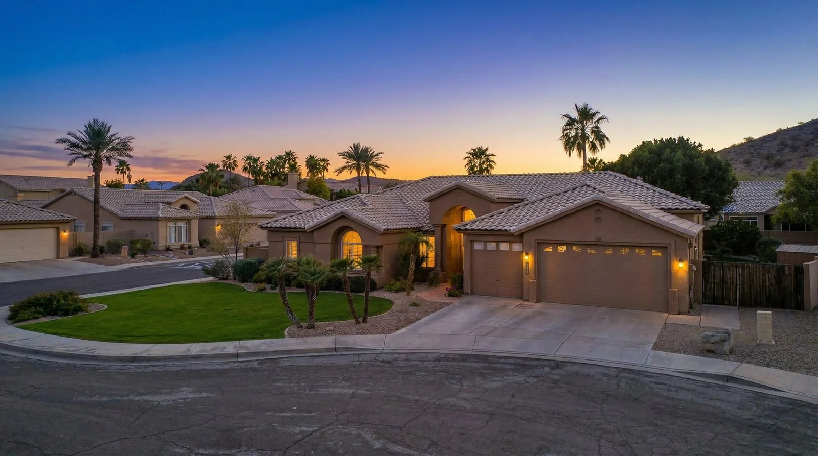 Aerial drone photo of a Glendale home with mature landscaping