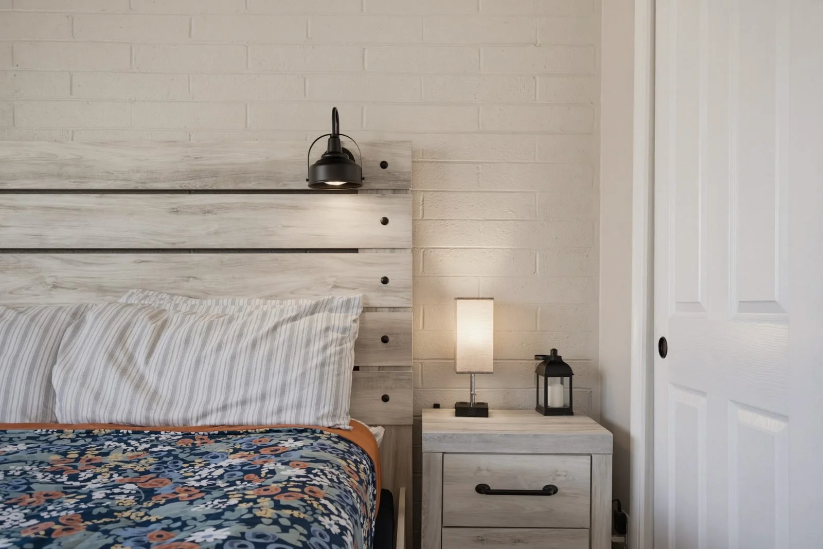 Bedroom headboard and nightstand detail in a Peoria home