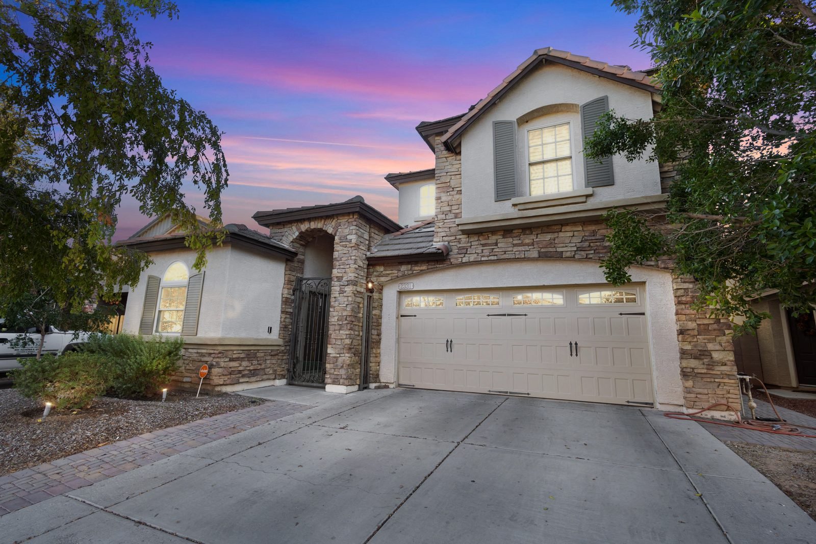 Twilight photo of a two-story home in Mesa, AZ, photographed by Valley View Photo