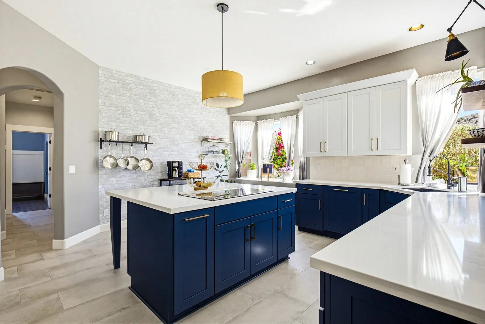 Modern kitchen with navy island in a Chandler home