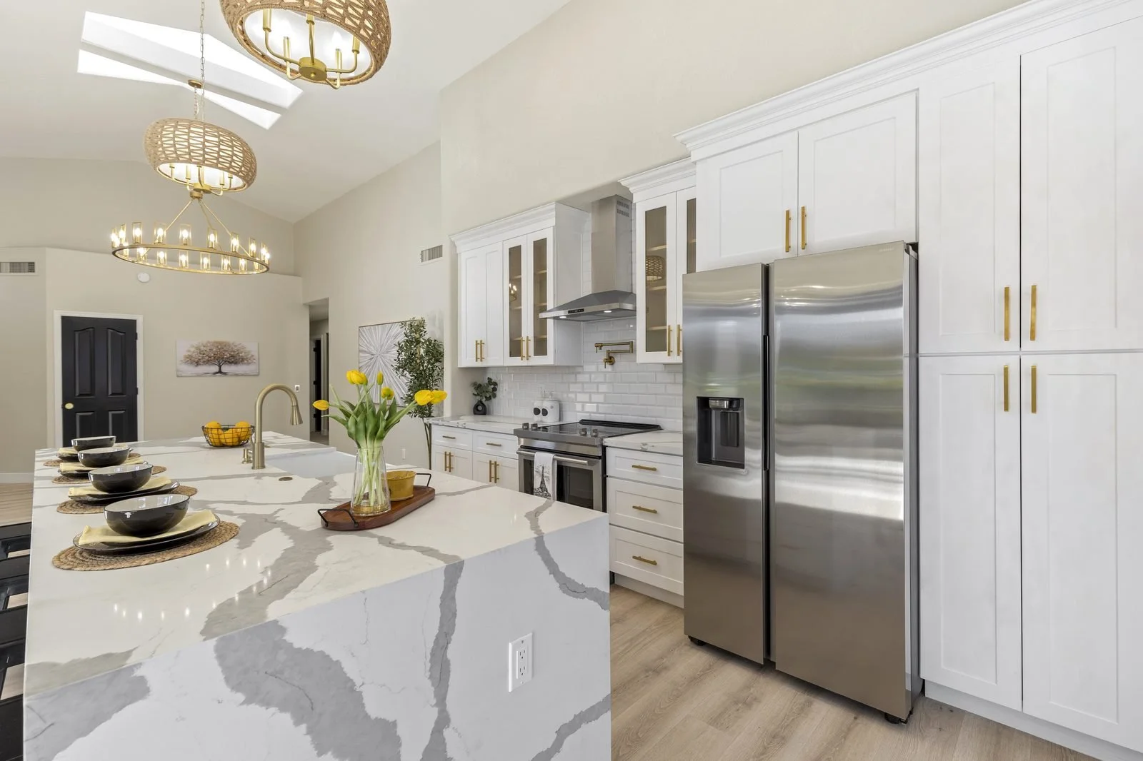 Updated white kitchen with stainless appliances in a Glendale home