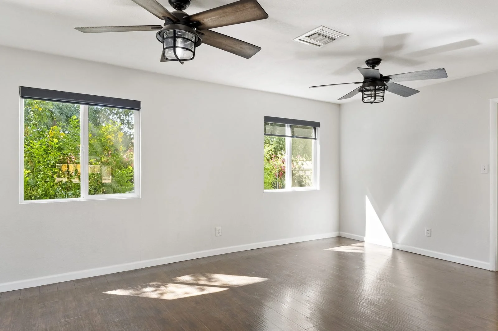 Vacant room with natural light in a Mesa home ready for virtual staging