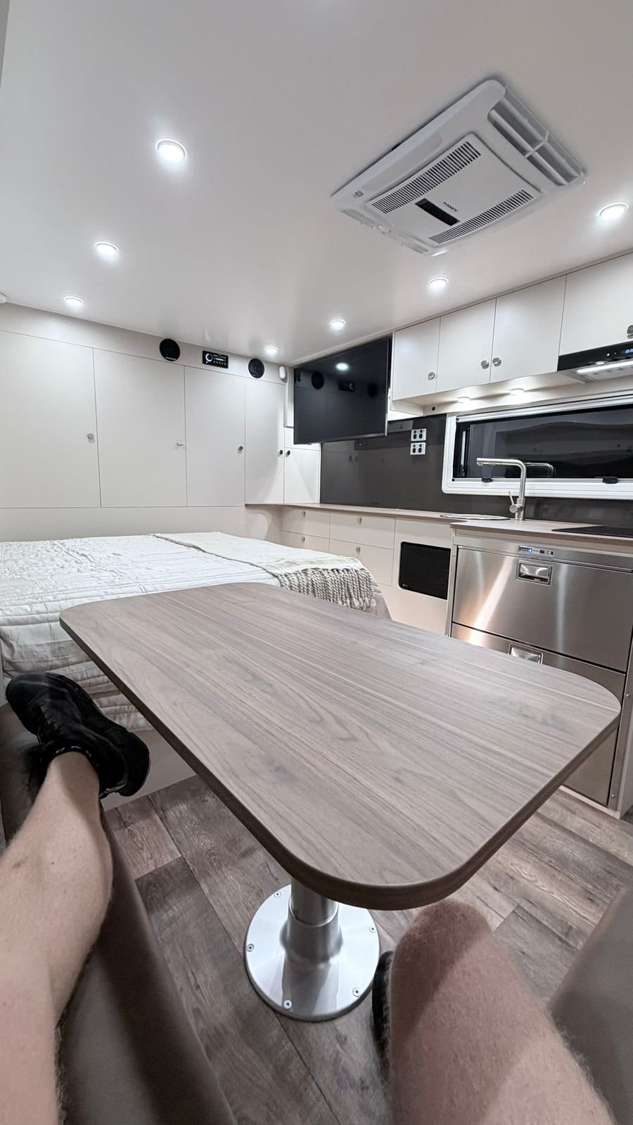 Wall-mounted smart TV above the kitchen