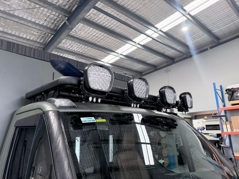 Wide shot of the four-light LED light bar mounted on the roof rack