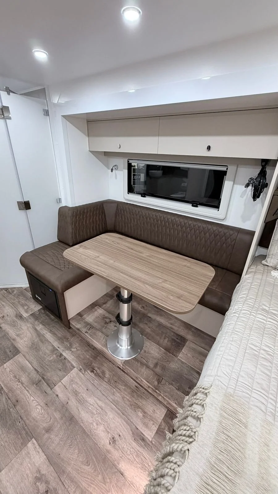 Leather quilted dinette seating with table