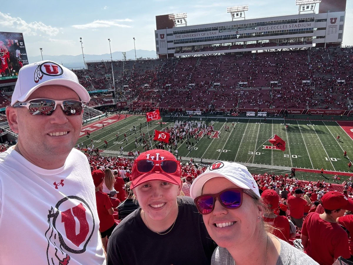Dr. Steven Ward with his family at a University of Utah football game