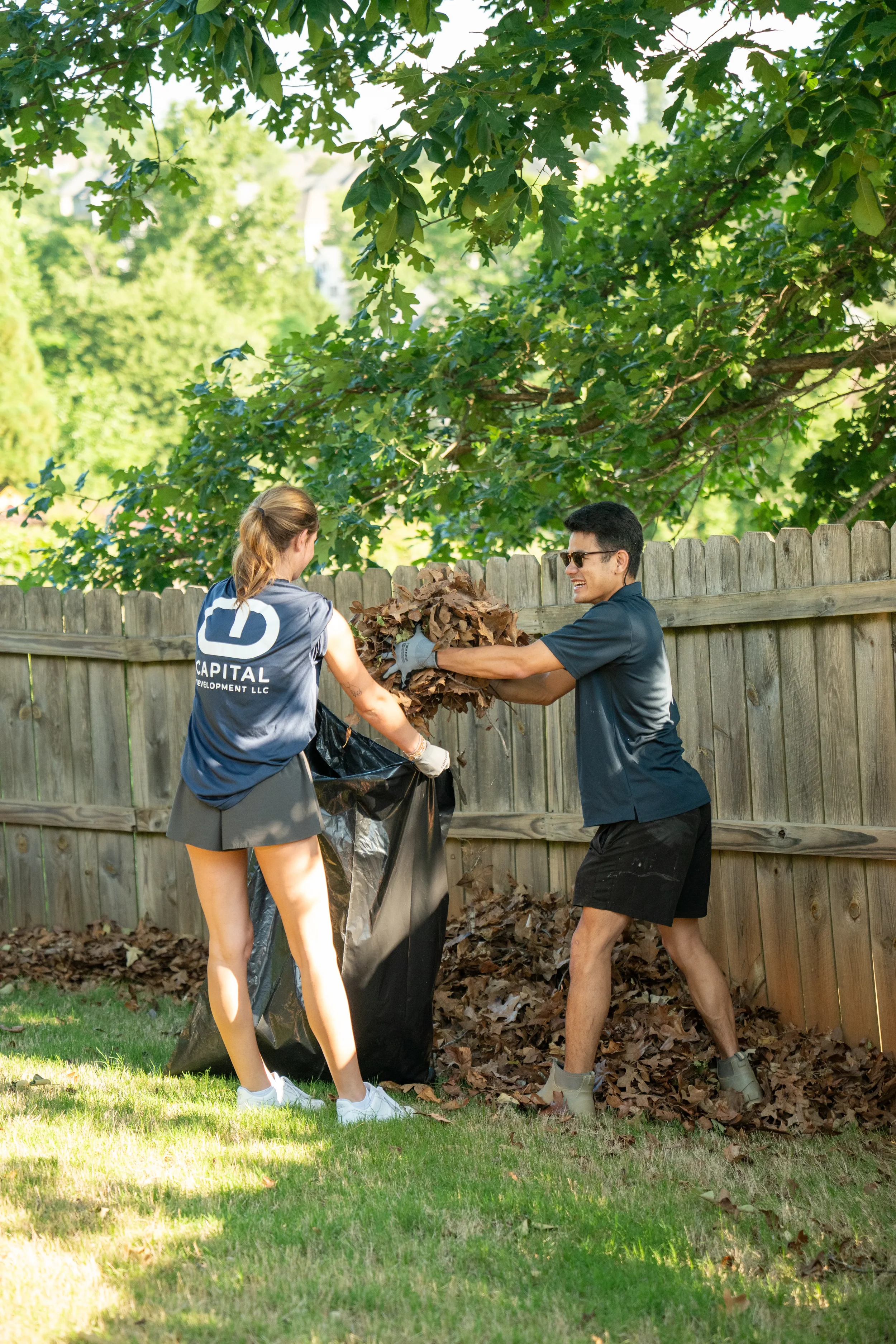 Capital Development team serving foster family through community service