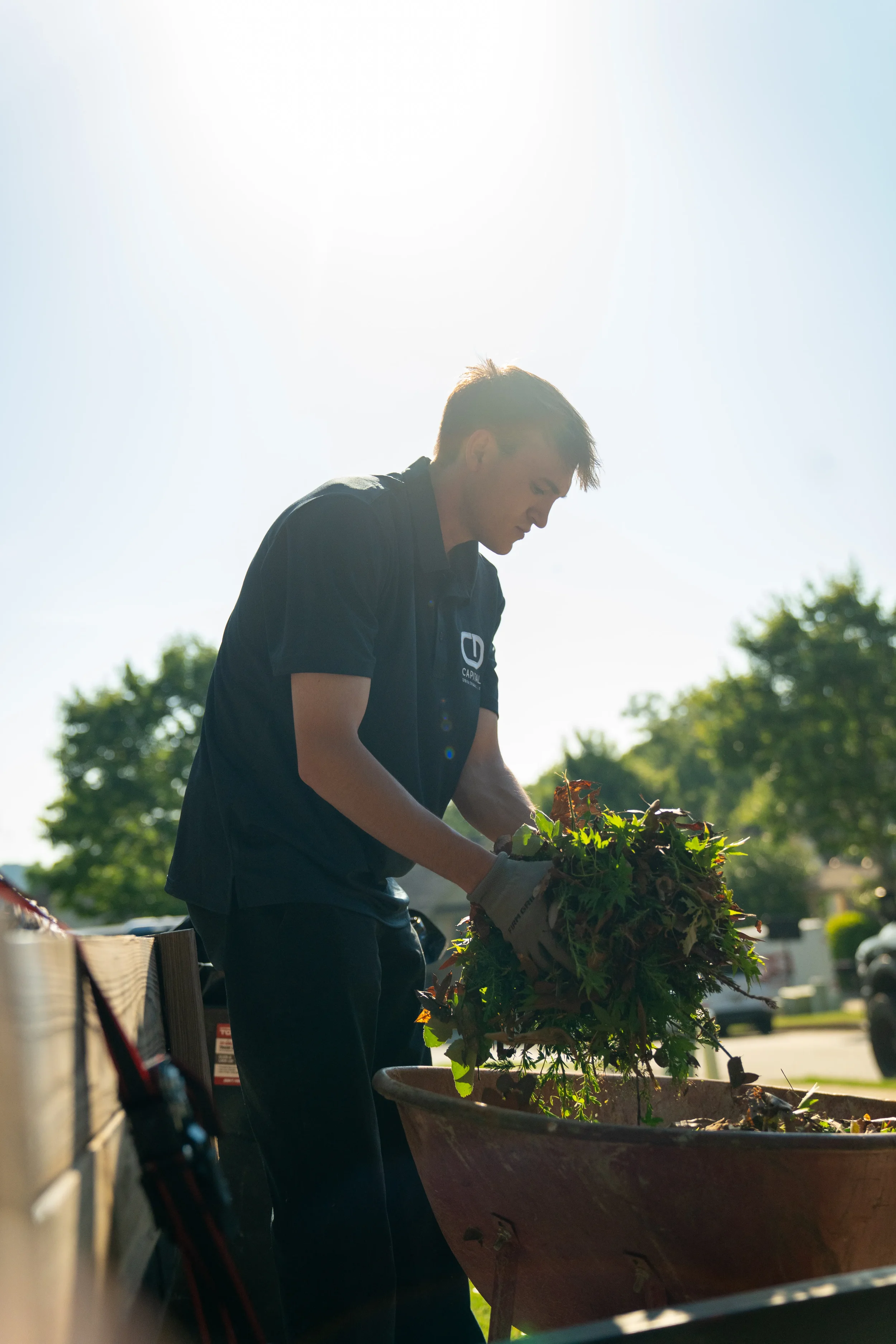 Capital Cares team doing yard cleanup and community beautification in Atlanta