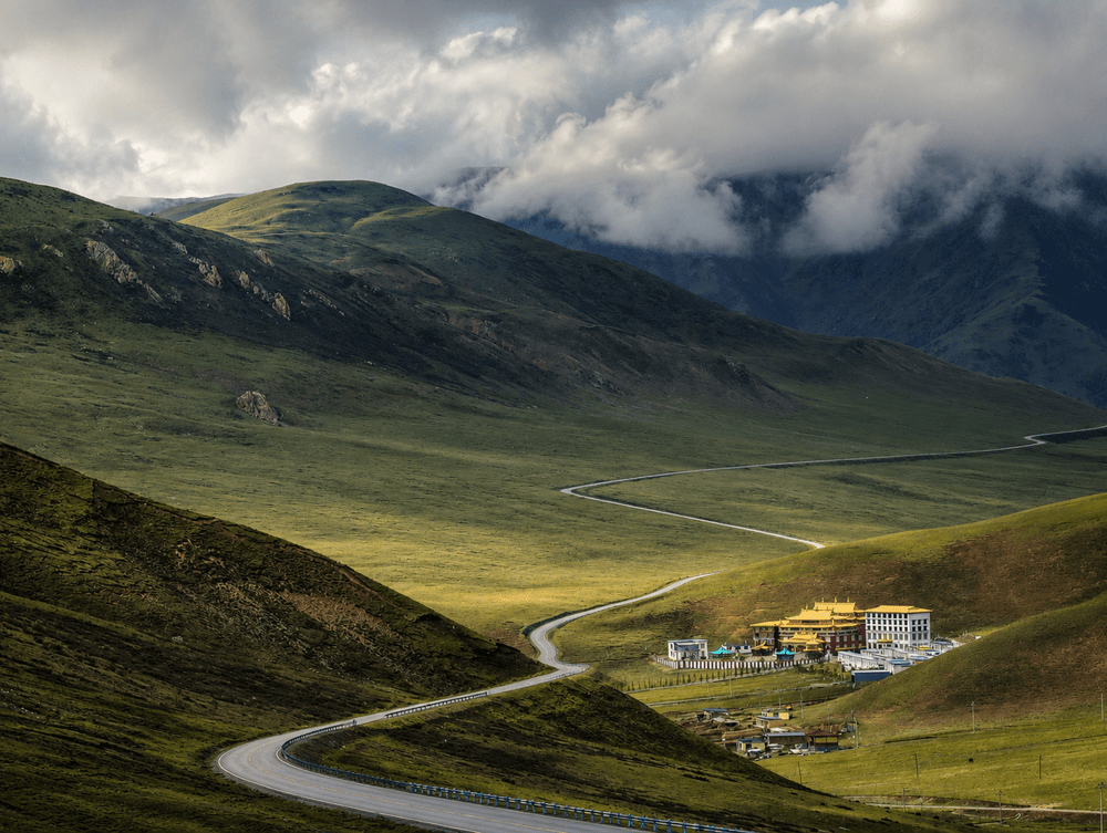 Road crossing the open Tibetan Plateau