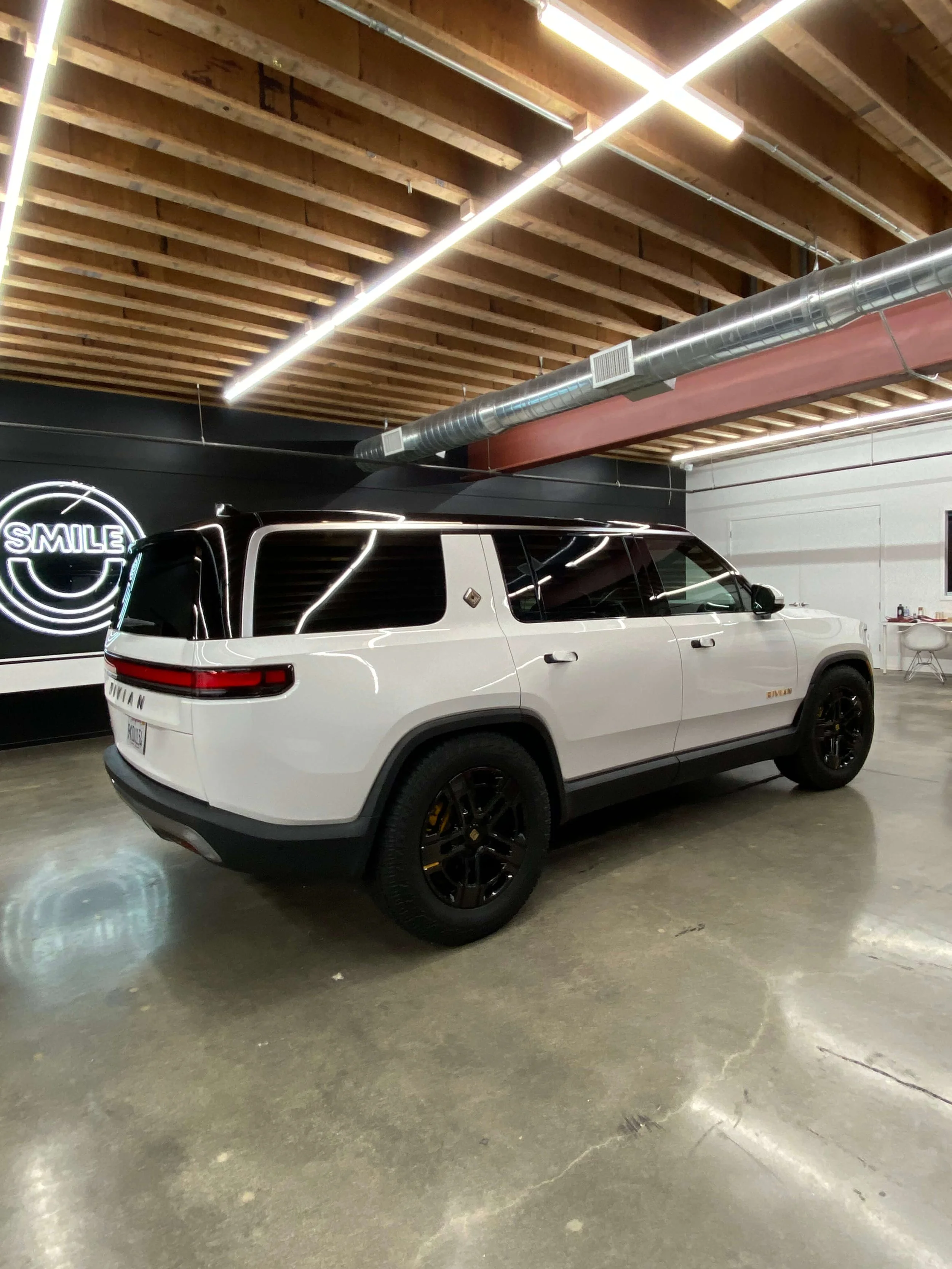 Rivian after receiving a full paint correction and IGL Kenzo ceramic coating at our Rancho Cucamonga detailing studio.