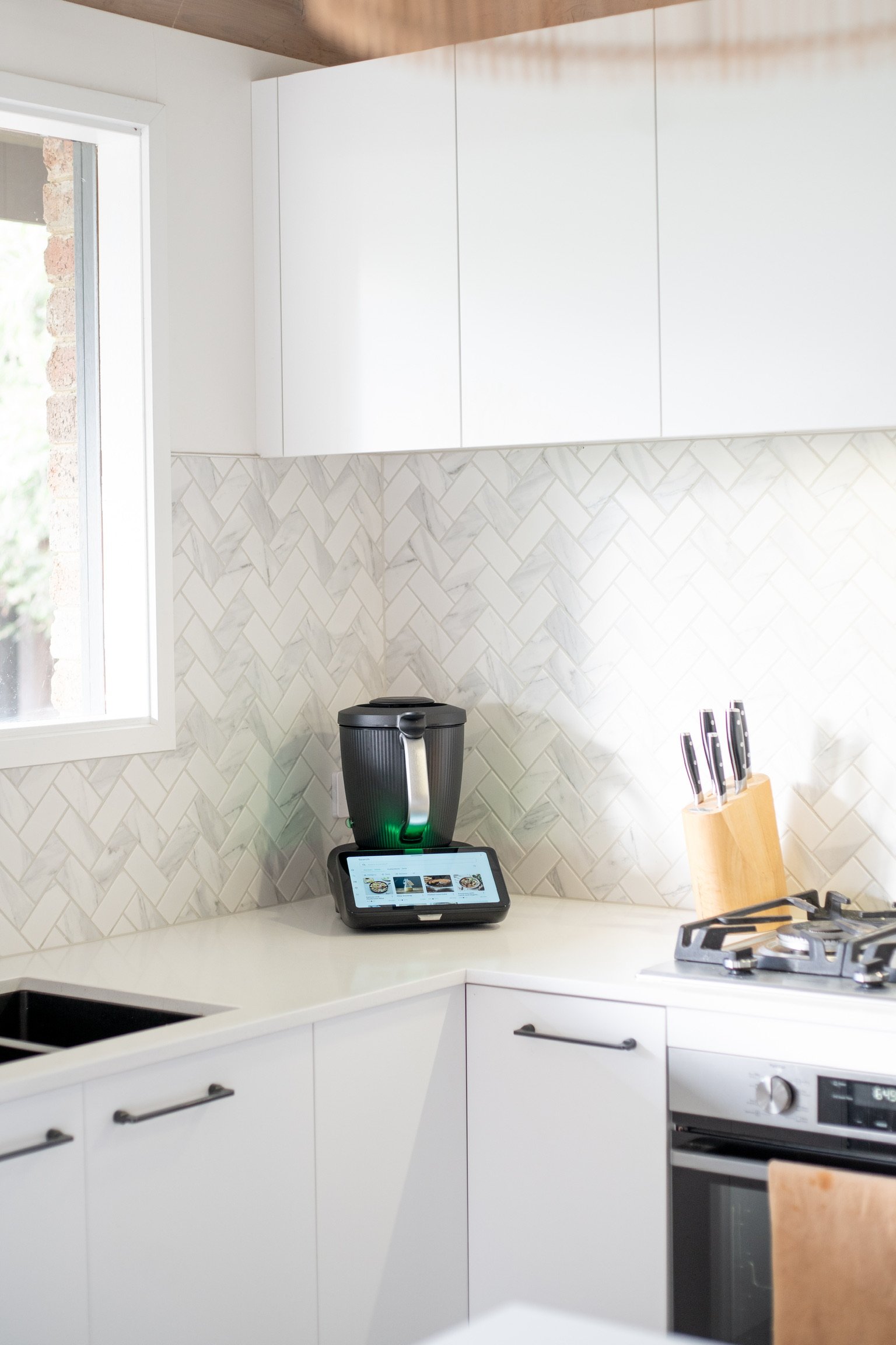 Thermomix in a warm home kitchen setting