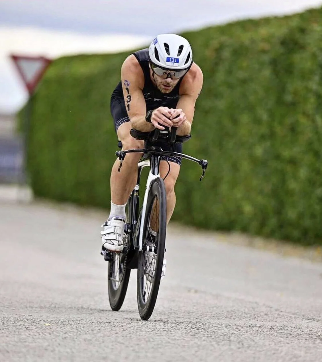 Alex racing on the bike