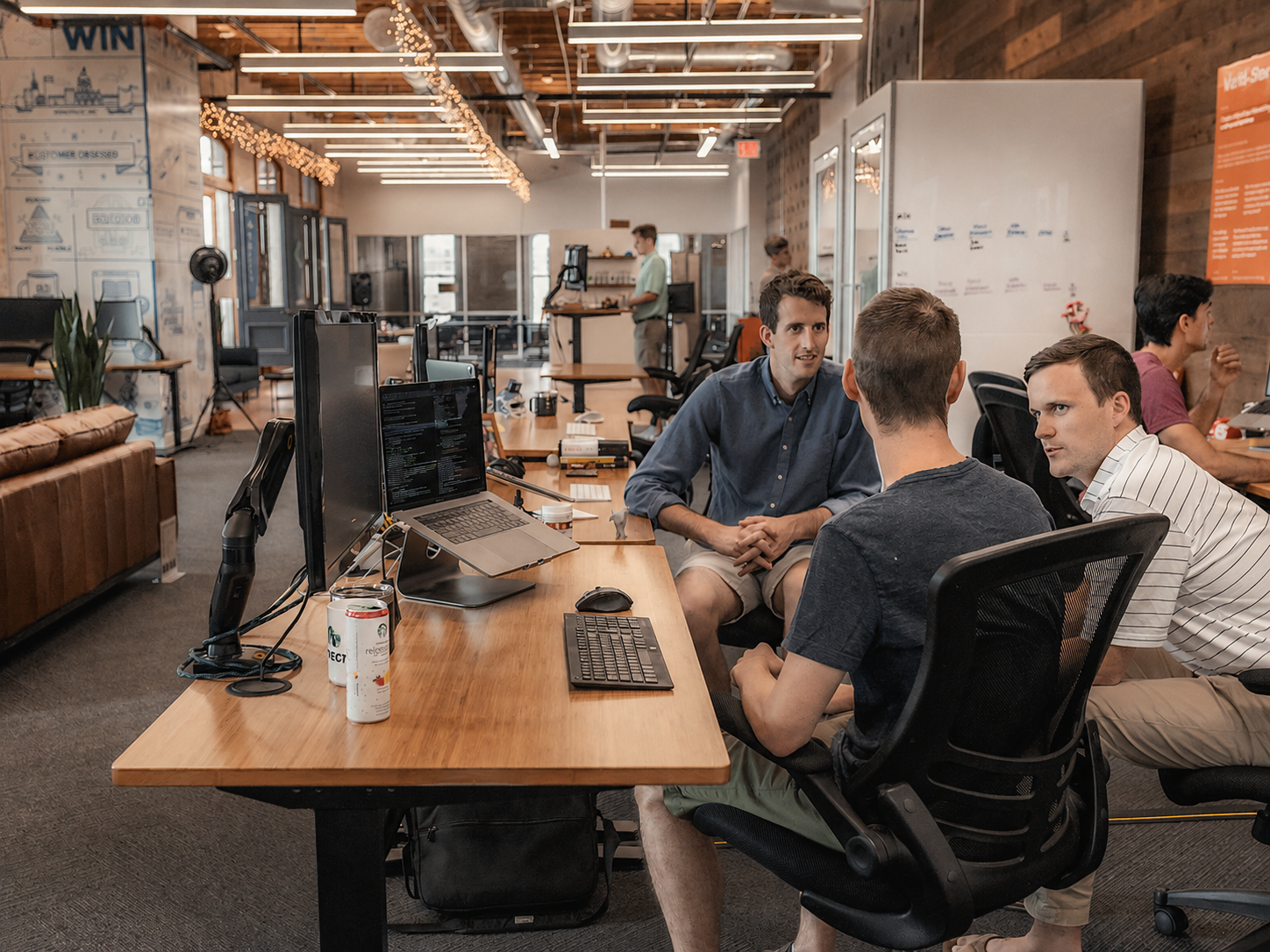 Advertising agency team reviewing campaign performance