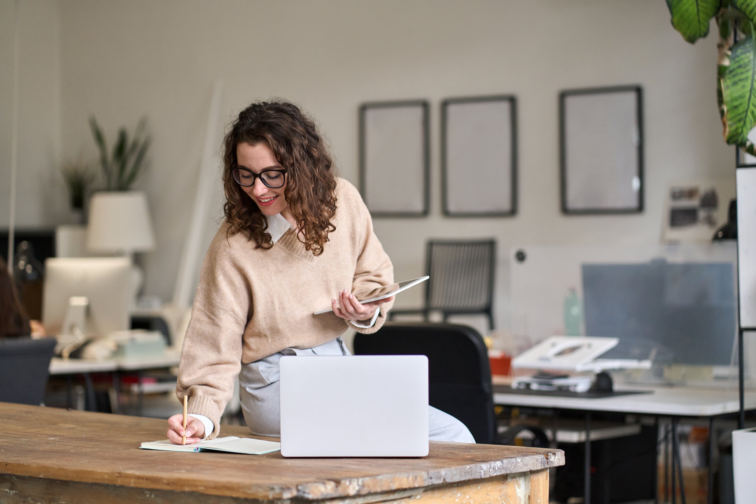Business owner planning strategy on wall