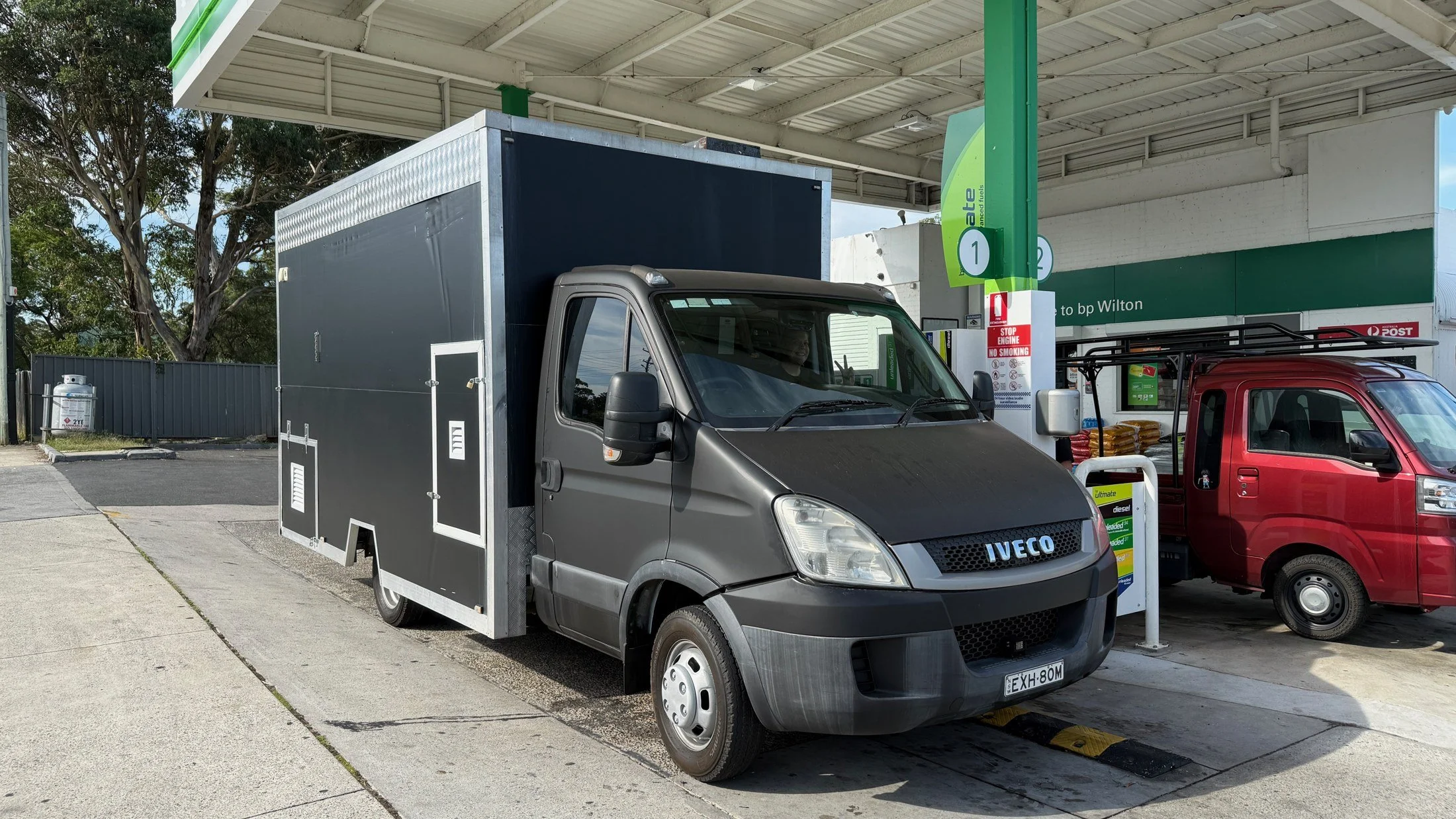 The Iveco Daily food truck in its early dark livery in March 2025