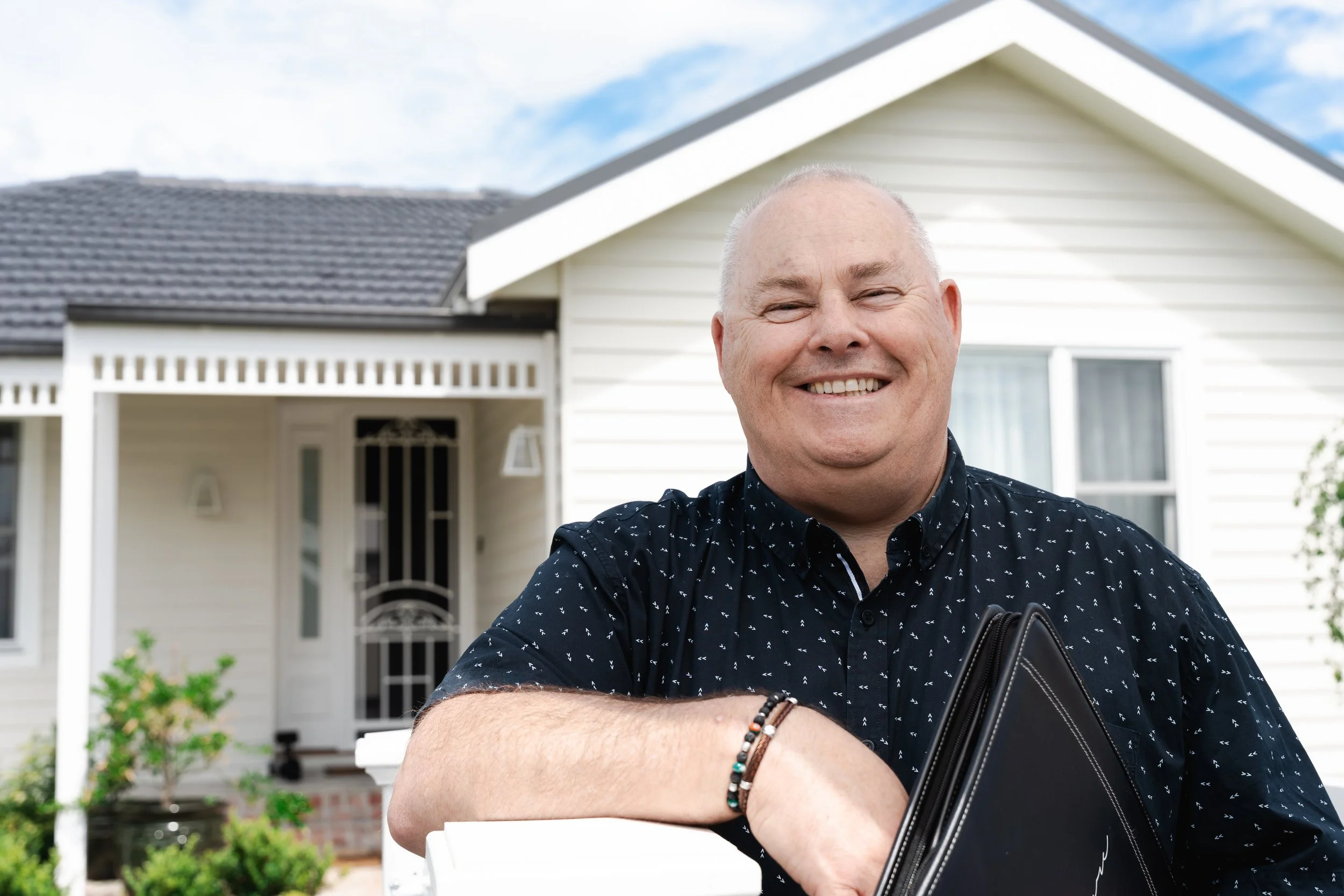 Rod Peirce outside a Bayside home