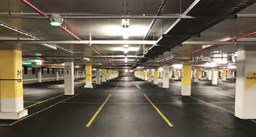 Safe-T Striping slip-resistant safety lines on a concrete floor