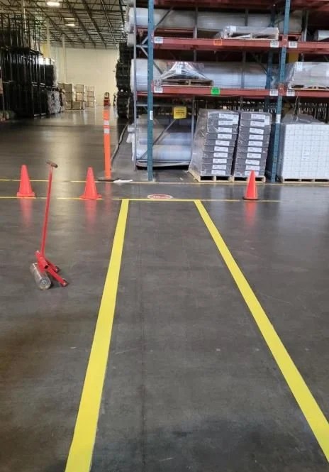 Safe-T Striping yellow safety lines in a facility