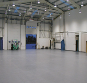Forklift driving on Safe-T Extreme flooring at a loading dock
