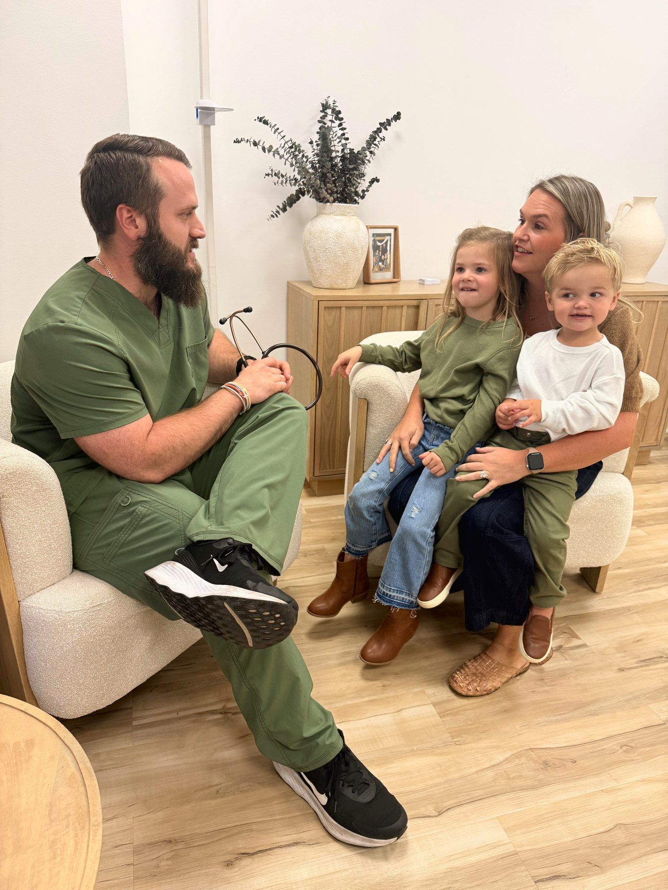 A Raleigh Well provider taking time with a family