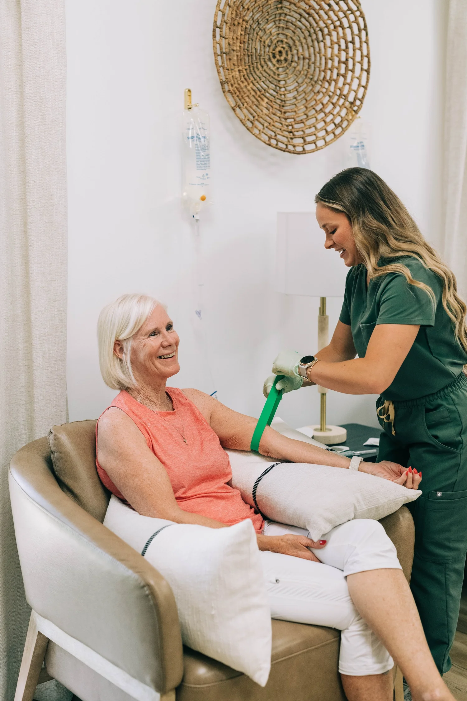 Nurse caring for an adult patient at Raleigh Well