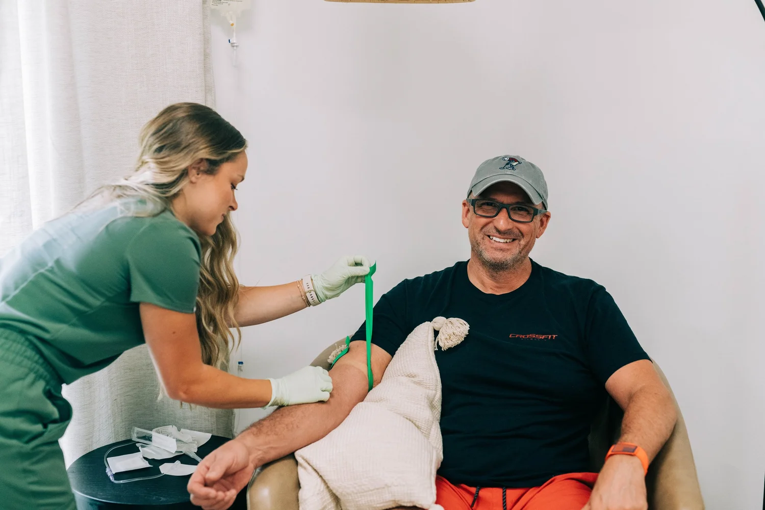 Man having blood drawn for a hormone panel at Raleigh Well