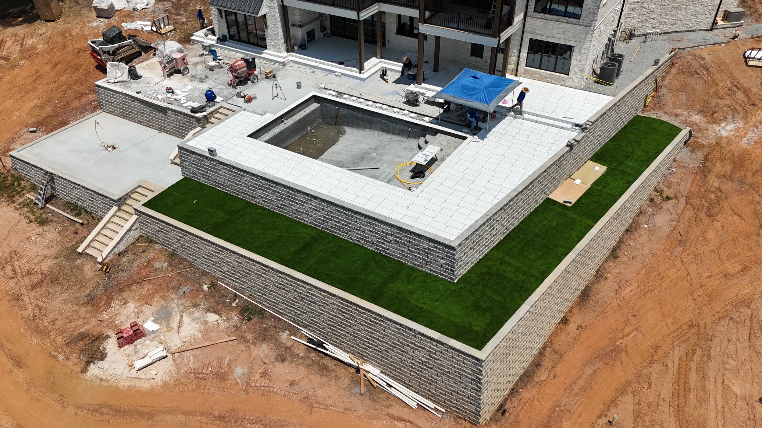 New-build pool terrace after