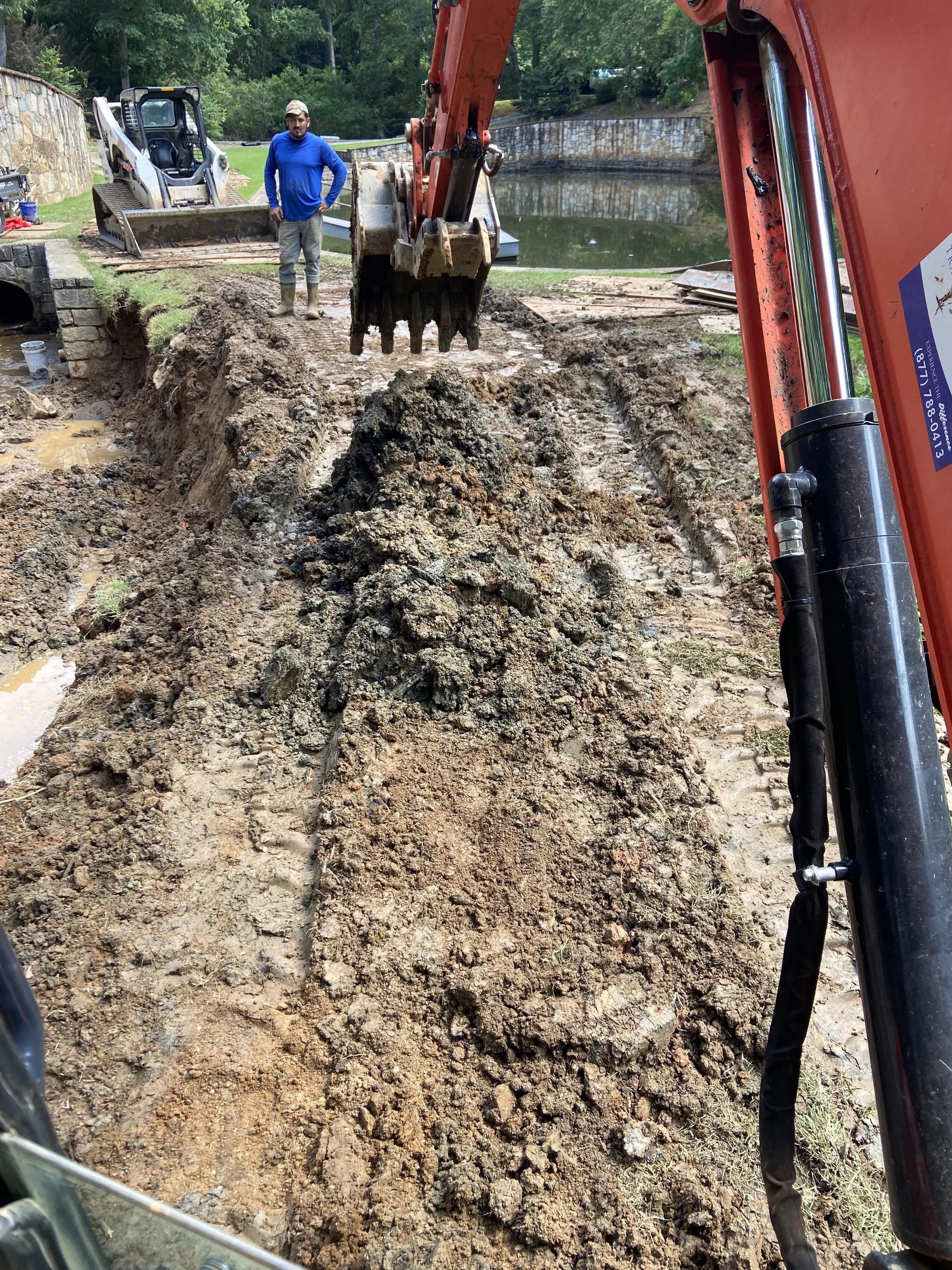 Channel and retaining wall before
