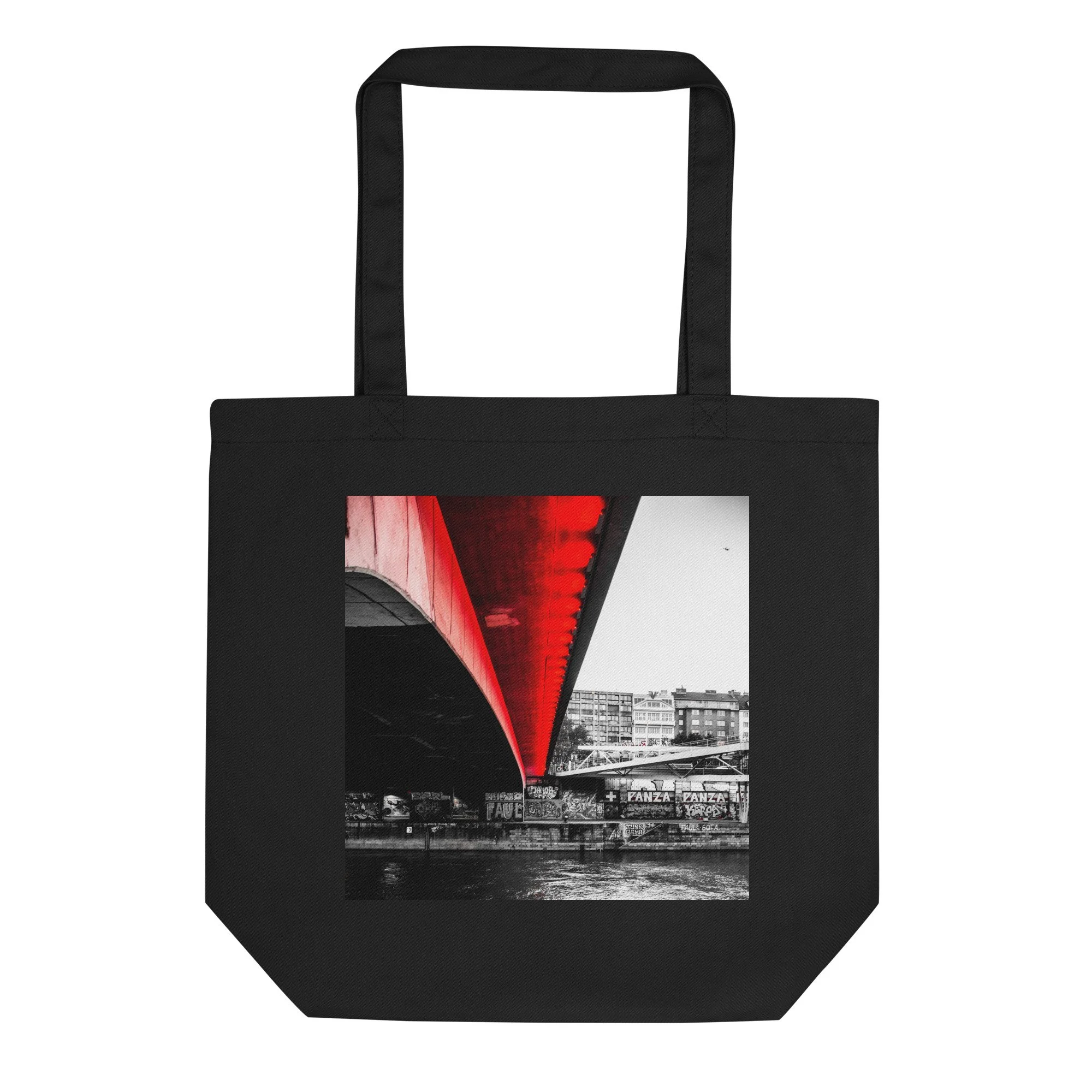 Custom tote bags and tech accessories featuring exclusive art