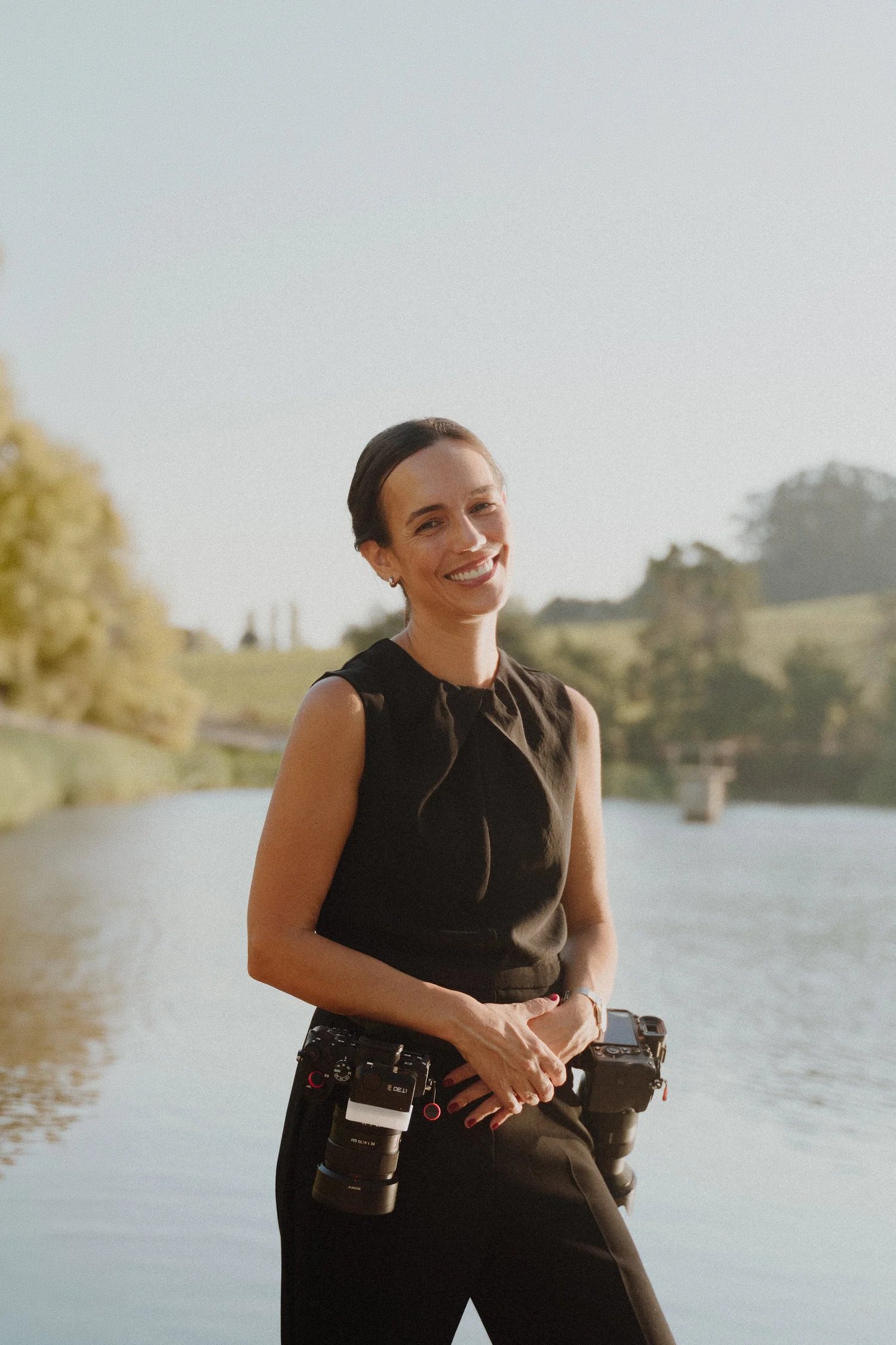 Sofia Brito, wedding photographer in Portugal, with her cameras