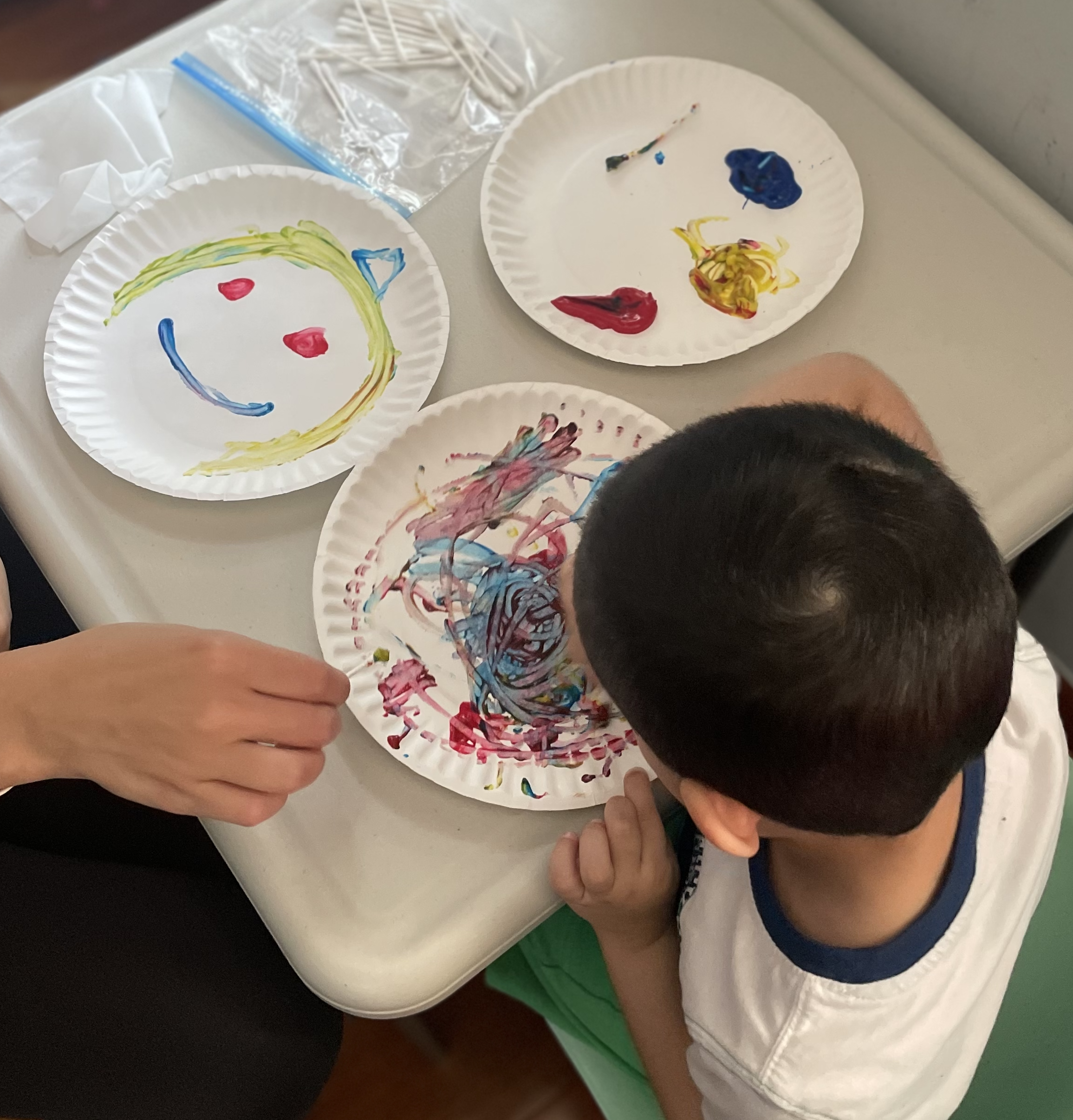 Child building speech and communication skills through play