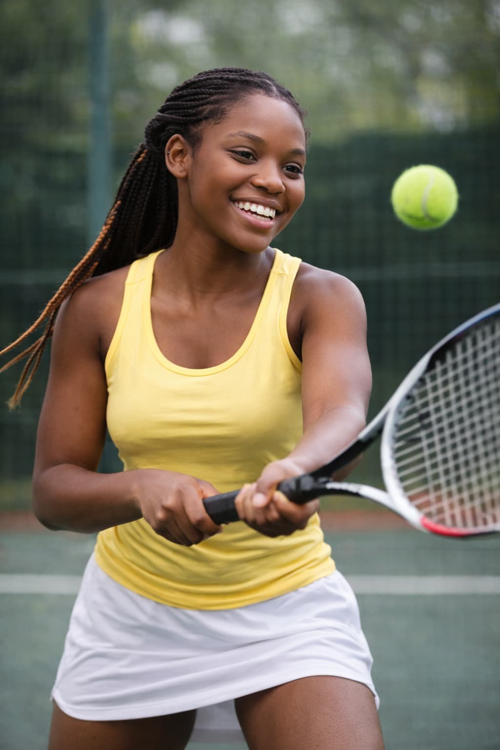 Students playing tennis