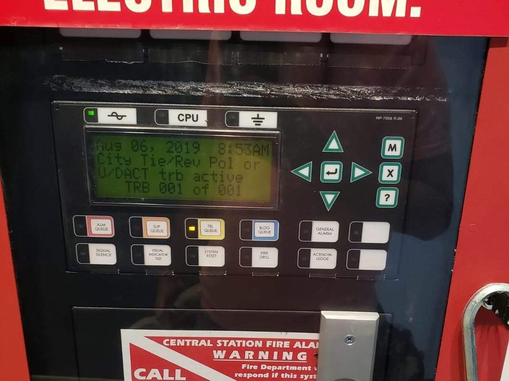Fire alarm control panel in a cellar electric room