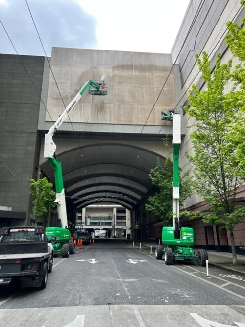 Seattle Convention Center wall after signage removal and cleaning – Plumb Signs
