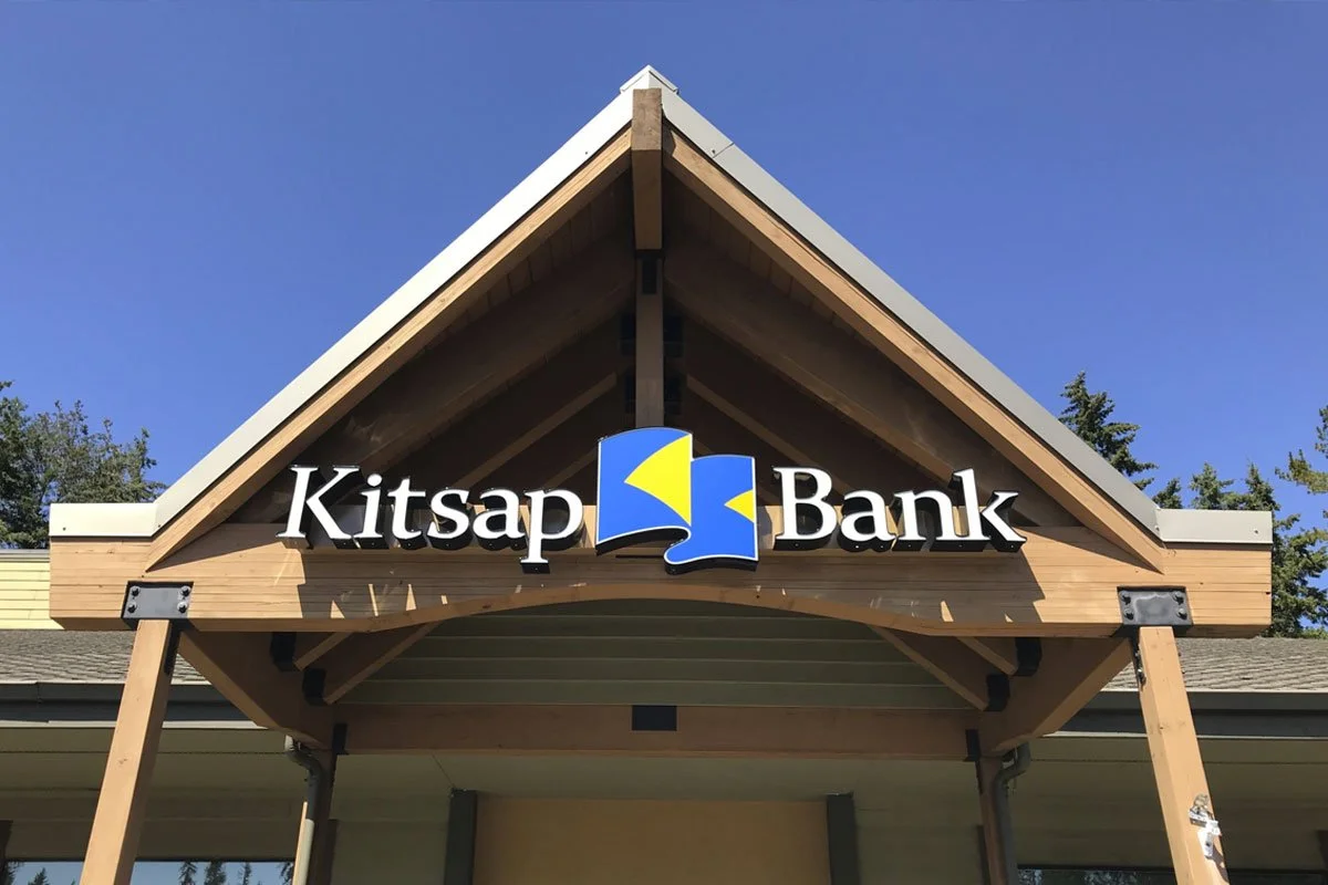 Kitsap Bank exterior channel letter signage under timber gable entry