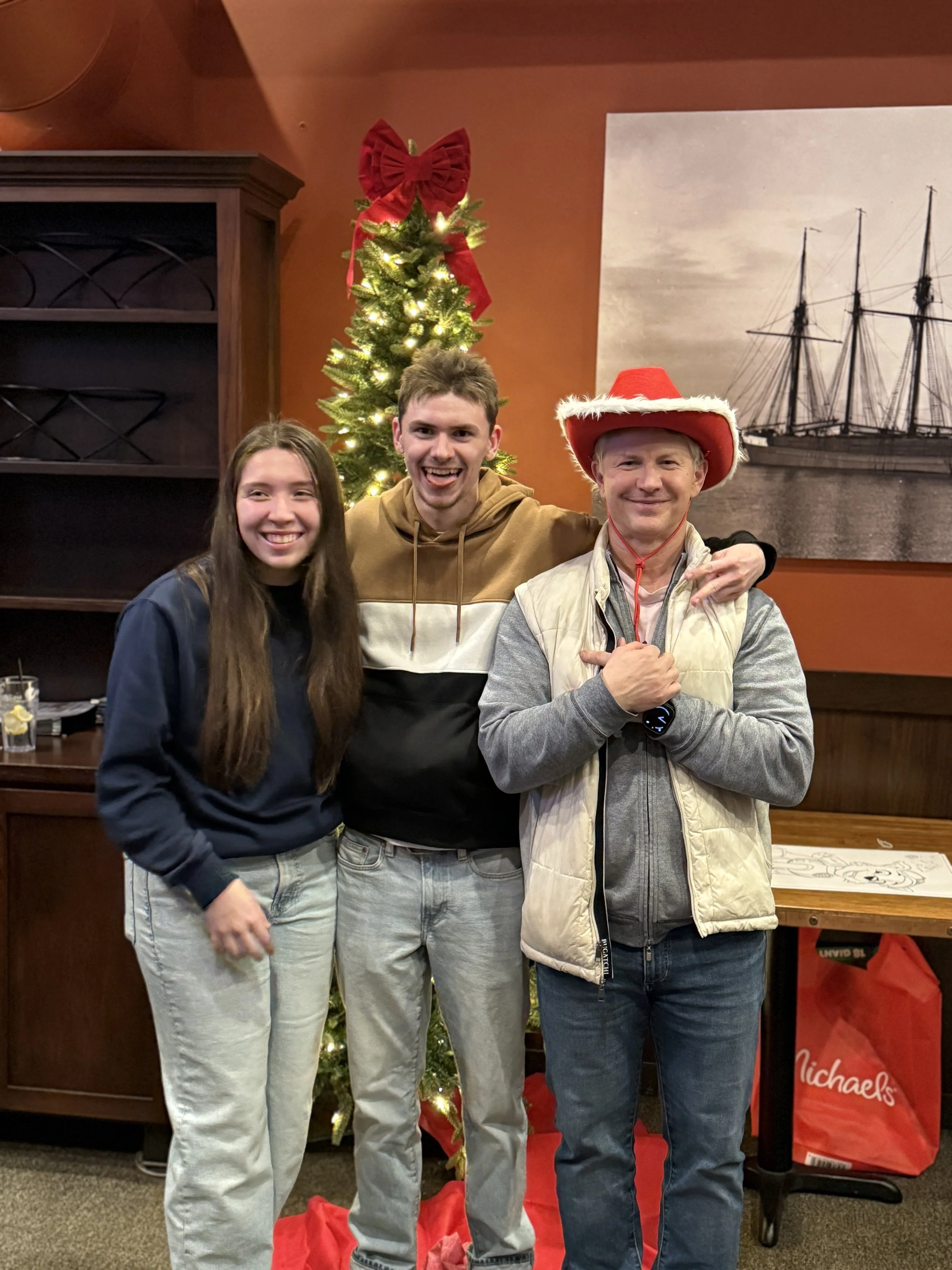 Plumb Signs holiday party group photo at Farrelli’s in Ruston