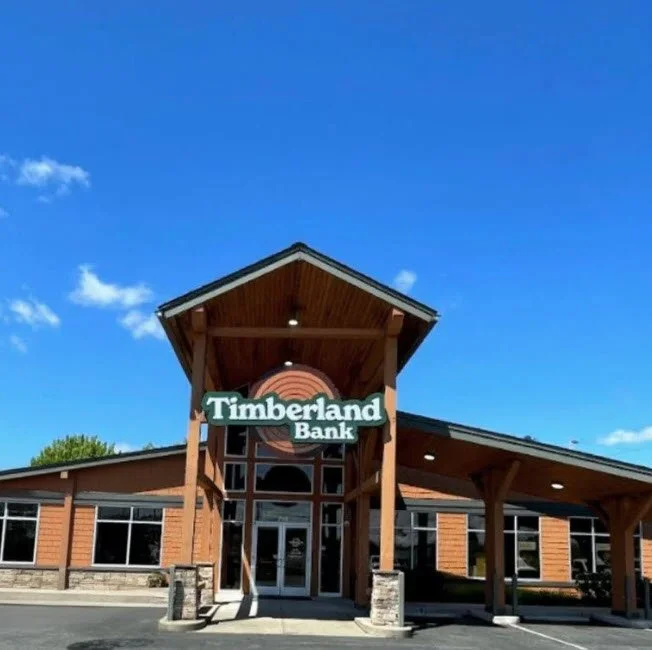 Timberland Bank exterior signage in Western Washington — refreshed brand identity at a community branch, illustrating the design and engineering standard Plumb Signs delivered across all 23 sites