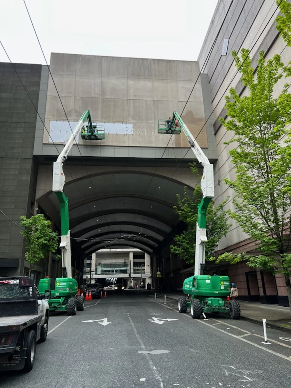 Crane installation of illuminated signage – Plumb Signs